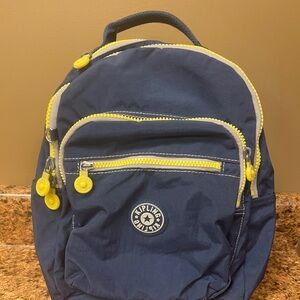 Kipling back pack. Navy blue and bright neon yellow.